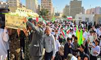 استقبال پرشور از شهید گمنام در مدرسه جامعه‌الصادق بندرعباس
